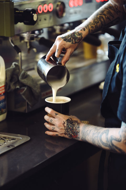 Barista pouring Allpress coffee at tarragindi grocer